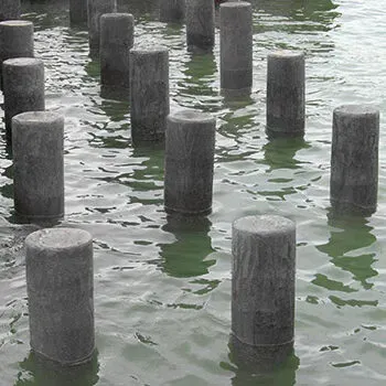 Brown Recycled Plastic Piles in water