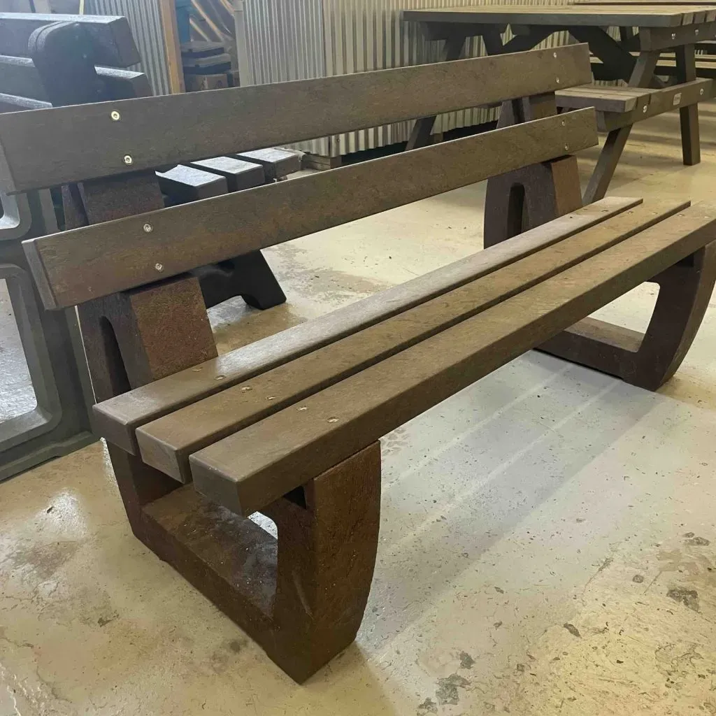 Recycled plastic park bench in brown