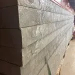 A pallet full of recycled plastic board or lumber