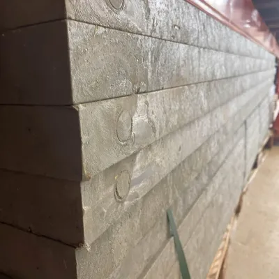 A pallet full of recycled plastic board or lumber